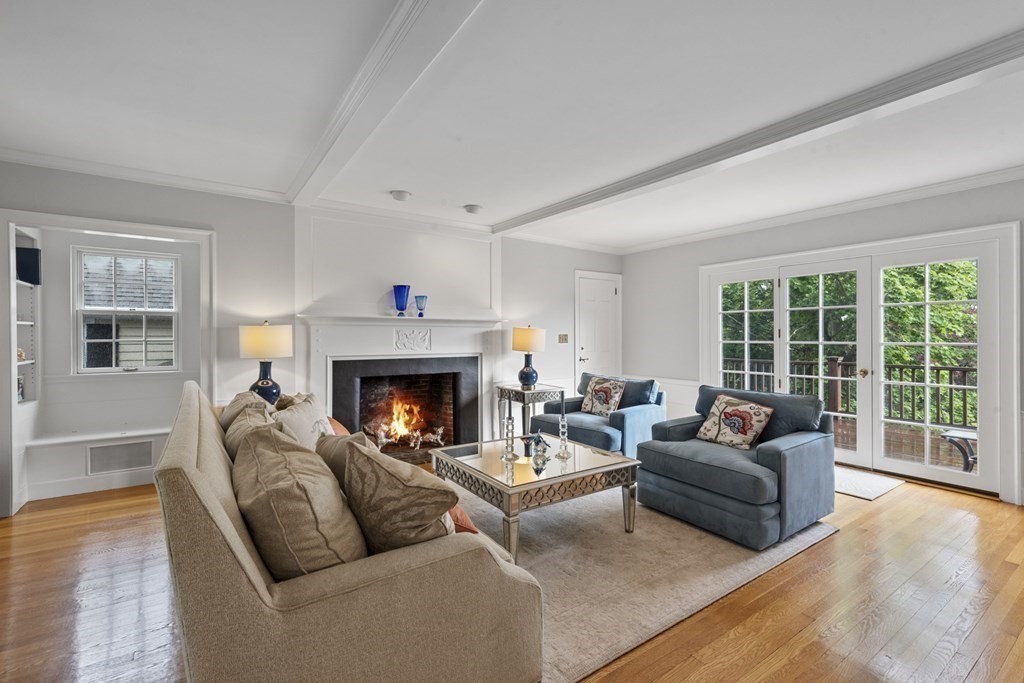 49 Harbor Avenue Marblehead, MA 01945 - Photo 9 of 42 a living room with furniture window and a fireplace
