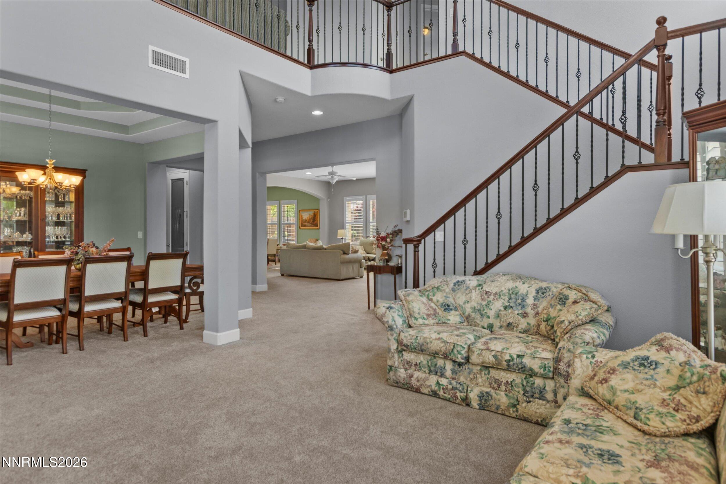 2920 Bull Rider Drive Reno, NV 89521 - Photo 6 of 51 a view of a livingroom with furniture and stairs