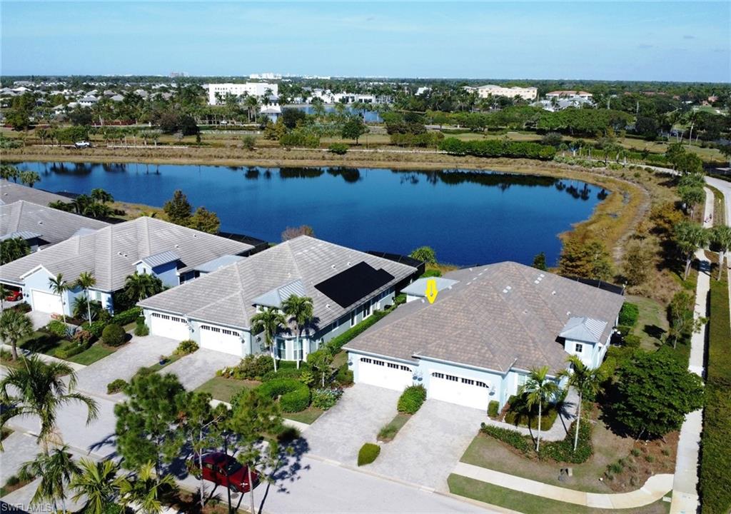 6809 Bequia Way Naples, FL 34113 - Photo 2 of 49 Drone / aerial view of a nearby body of water