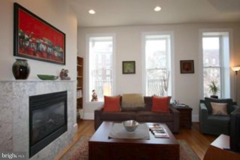 Gorgeous carrera marble gas fireplace!
