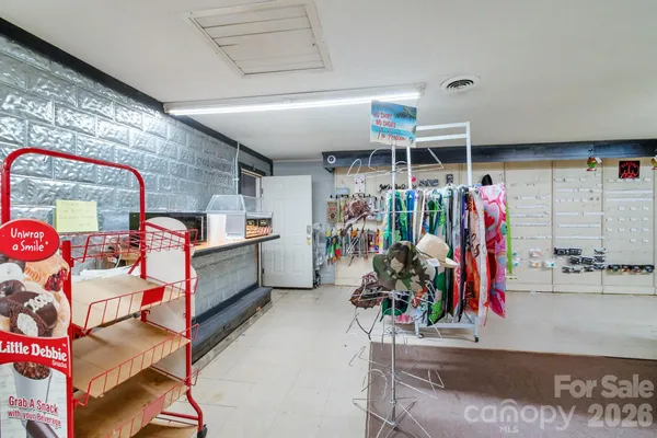 a garage with storage and white walls