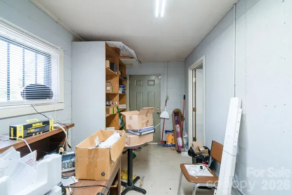 a utility room with storage and utility