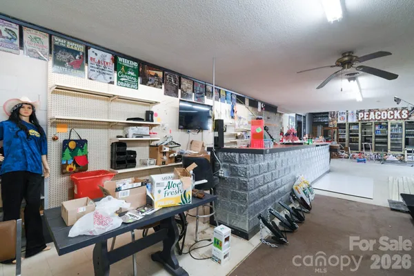 a room with furniture and a flat screen tv
