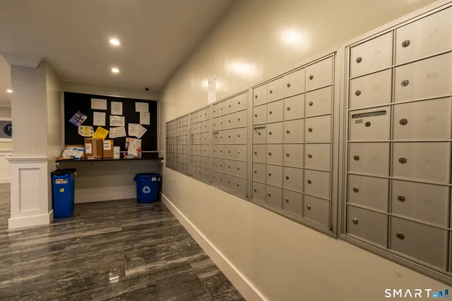 a view of walk in closet and window