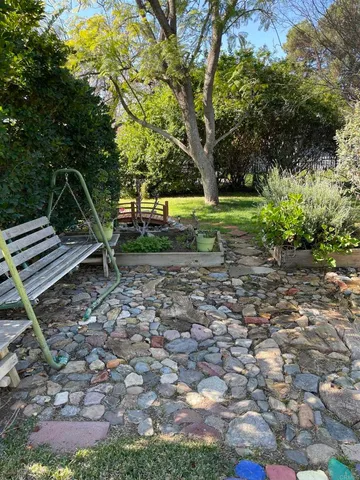 a backyard of a house with lots of green space