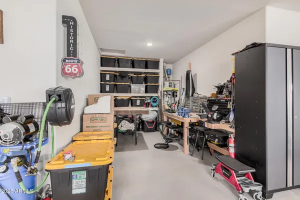 a bathroom with a sink a mirror and a shower