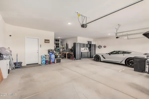 a view of a room with workspace and toys