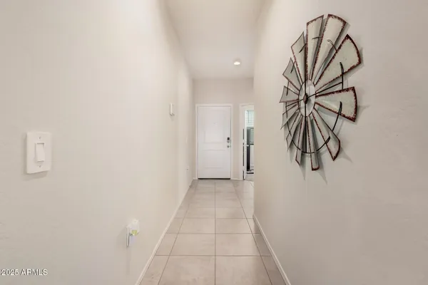 a view of a house with a yard and pathway