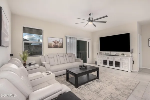 a living room with furniture and a window