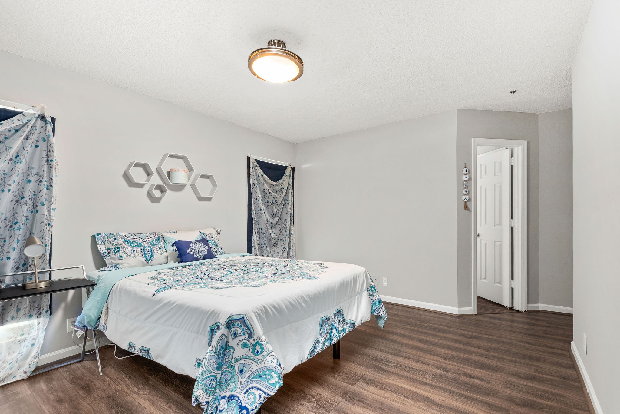 305 Cedarcliff Road Antioch, TN 37013 - Photo 17 of 32 a bedroom with a bed and a table