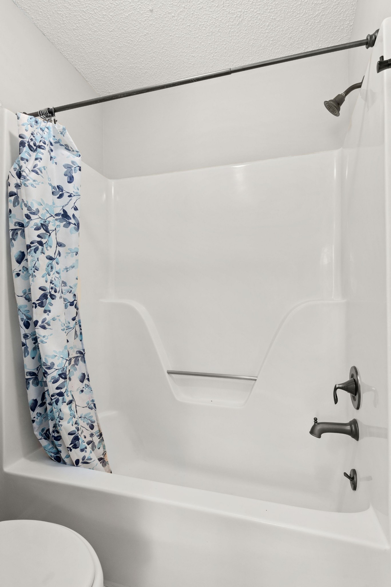 305 Cedarcliff Road Antioch, TN 37013 - Photo 20 of 32 a bathroom with a bathtub and shower
