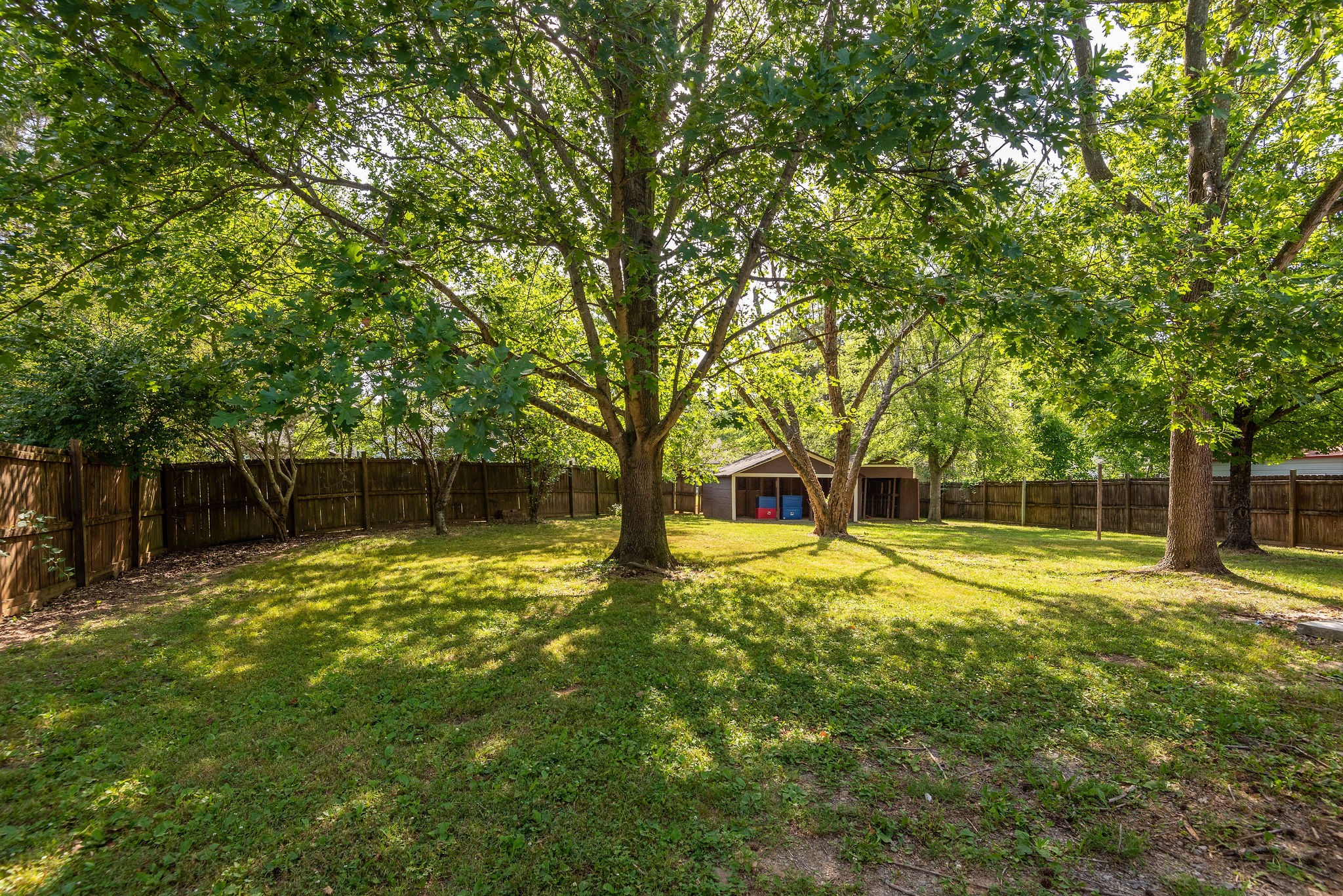 305 Cedarcliff Road Antioch, TN 37013 - Photo 29 of 32 a house with trees in front of it