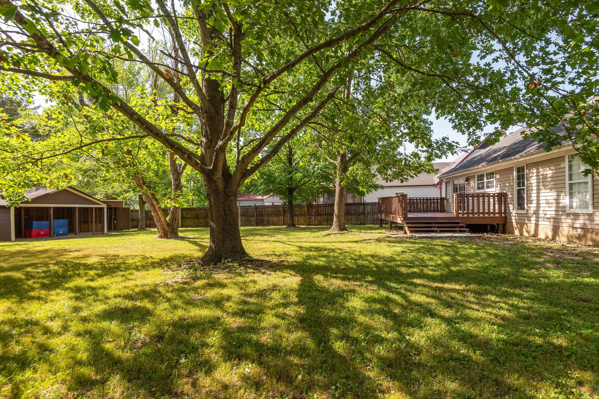 305 Cedarcliff Road Antioch, TN 37013 - Photo 30 of 32 a view of a house with backyard and trees