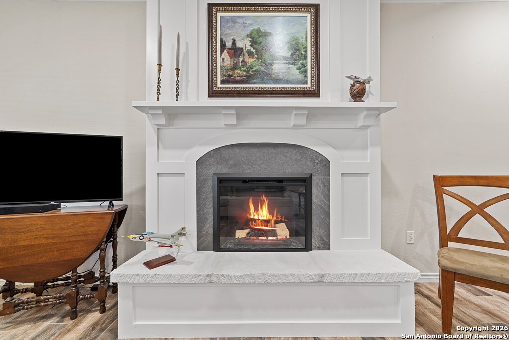 1008 Edinburgh Drive Kerrville, TX 78028 - Photo 12 of 24 a living room with furniture and a fireplace