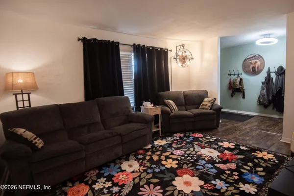 a living room with furniture and a couch