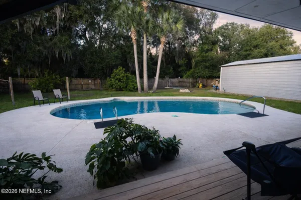 a view of outdoor space yard and swimming pool