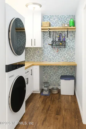 a view of living room washer and dryer