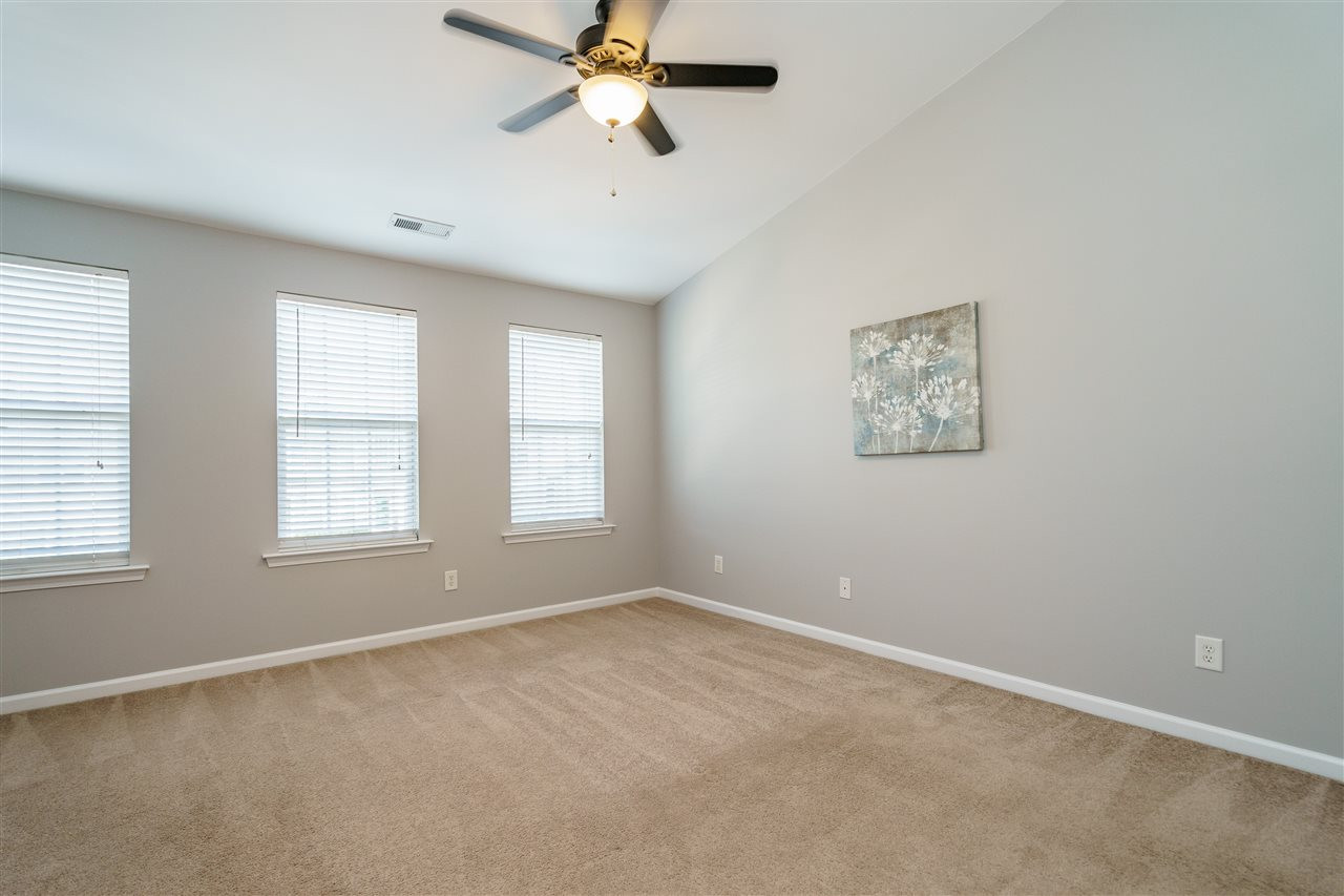 7675 Winners Edge Street Raleigh, NC 27617 - Photo 11 of 23 a view of an empty room with a window