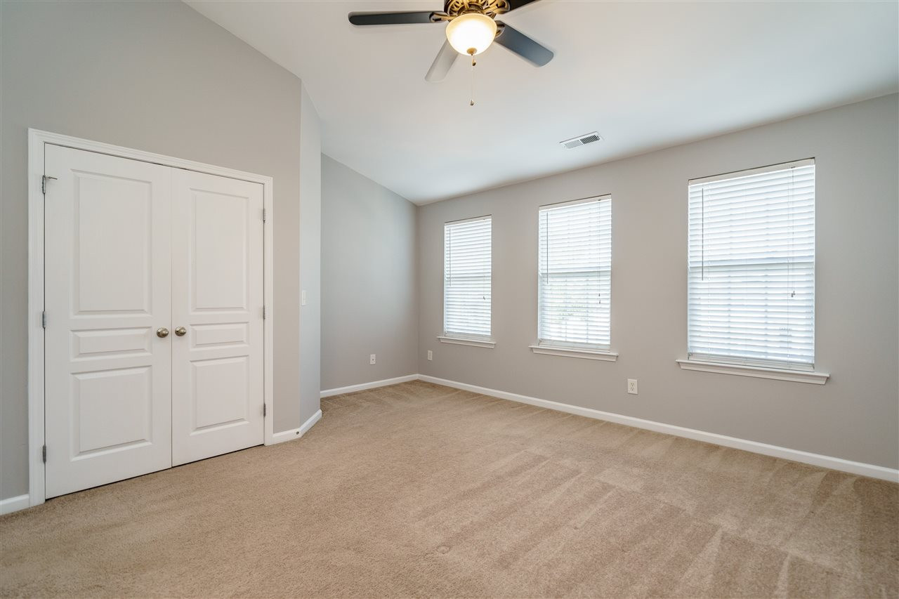 7675 Winners Edge Street Raleigh, NC 27617 - Photo 12 of 23 a view of an empty room with a window