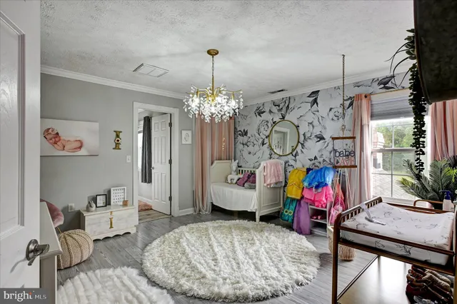 an aerial view of a house with outdoor space lake view and lake view