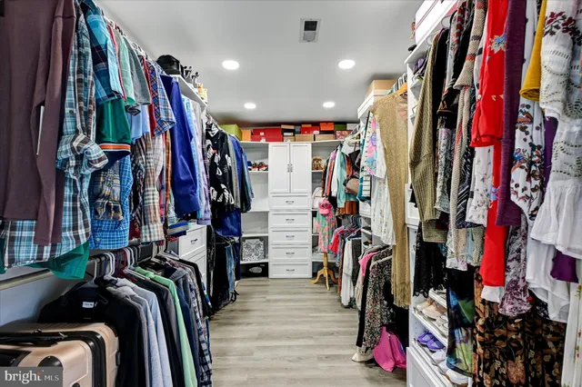 an aerial view of a house with outdoor space pool seating area and yard