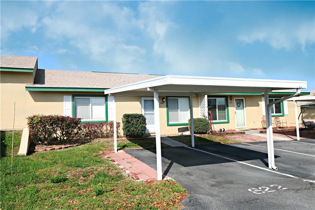 622 Ridge Terrace, Unit 622 Winter Haven, FL 33881 - Photo 1 of 1 Exterior Front with Carport - Two assigned parking spaces