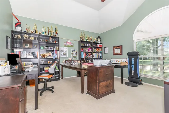a view of a workspace with furniture