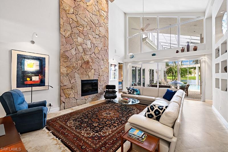 433 Crestwood Road Naples, FL 34113 - Photo 13 of 50 Great Room out to lanai