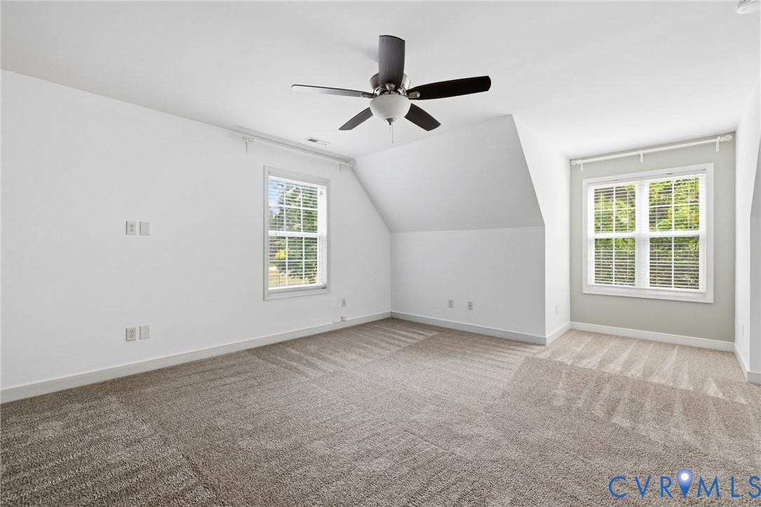 13524 Mountcastle Road Chesterfield, VA 23832 - Photo 25 of 44 Spacious room featuring vaulted ceilings, a contem
