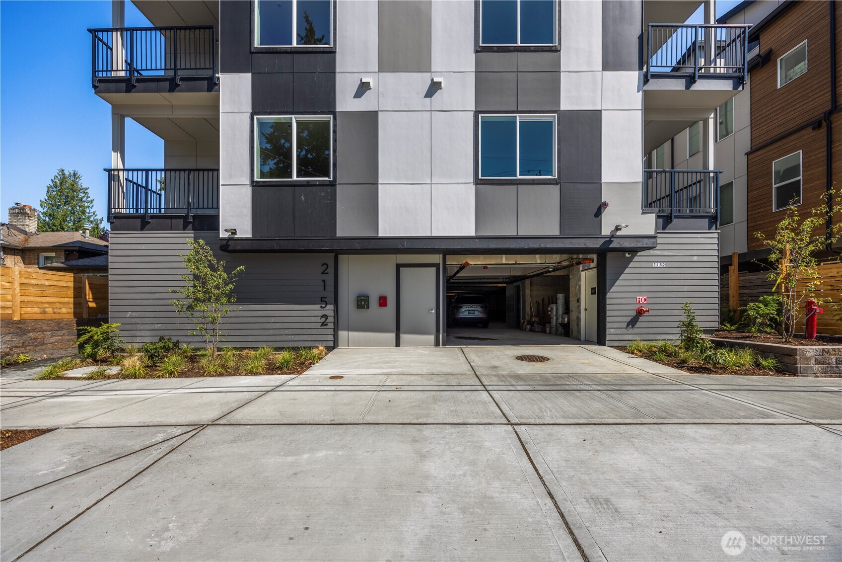 2152 North 185th Street Shoreline, WA 98133 - Photo 2 of 40 a front view of a multi story residential apartment building