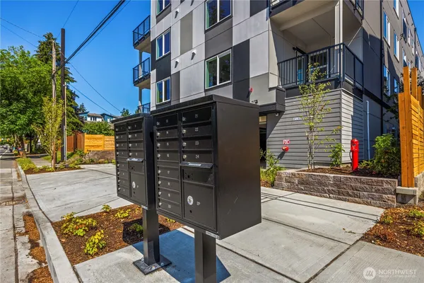 a view of a brick building with many windows