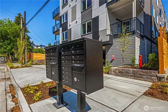 a view of a brick building with many windows