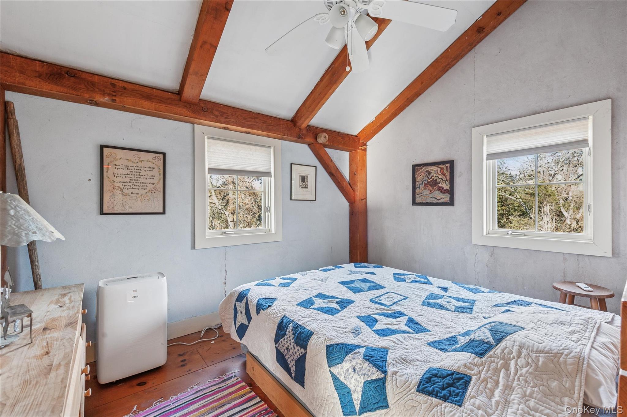 7 Jagger Lane Westhampton, NY 11977 - Photo 11 of 22 Bedroom with ceiling fan