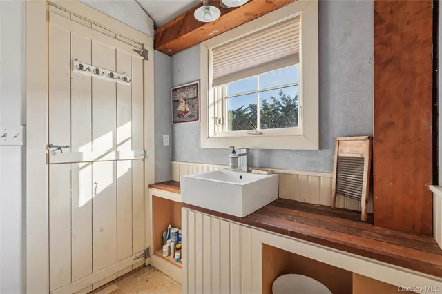a view of a living room and a hallway