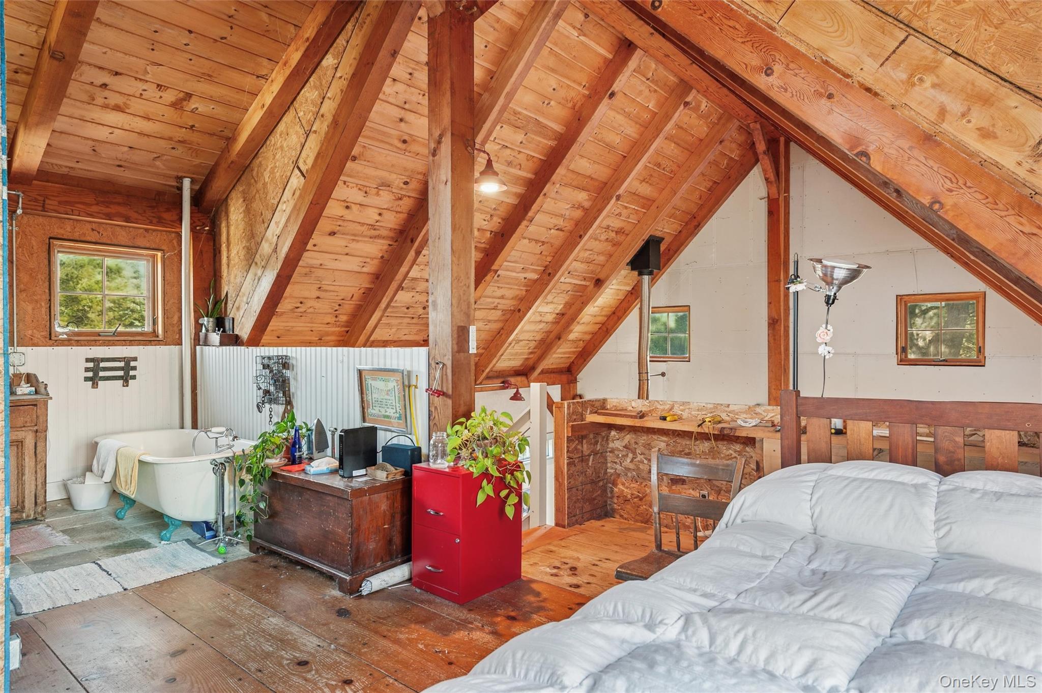 7 Jagger Lane Westhampton, NY 11977 - Photo 14 of 22 Bedroom featuring hardwood / wood-style flooring, wooden ceiling, and wooden walls