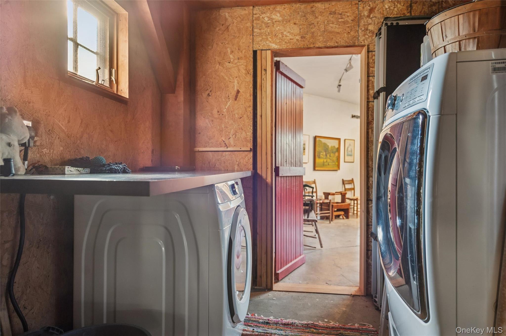 7 Jagger Lane Westhampton, NY 11977 - Photo 16 of 22 Laundry area with concrete flooring
