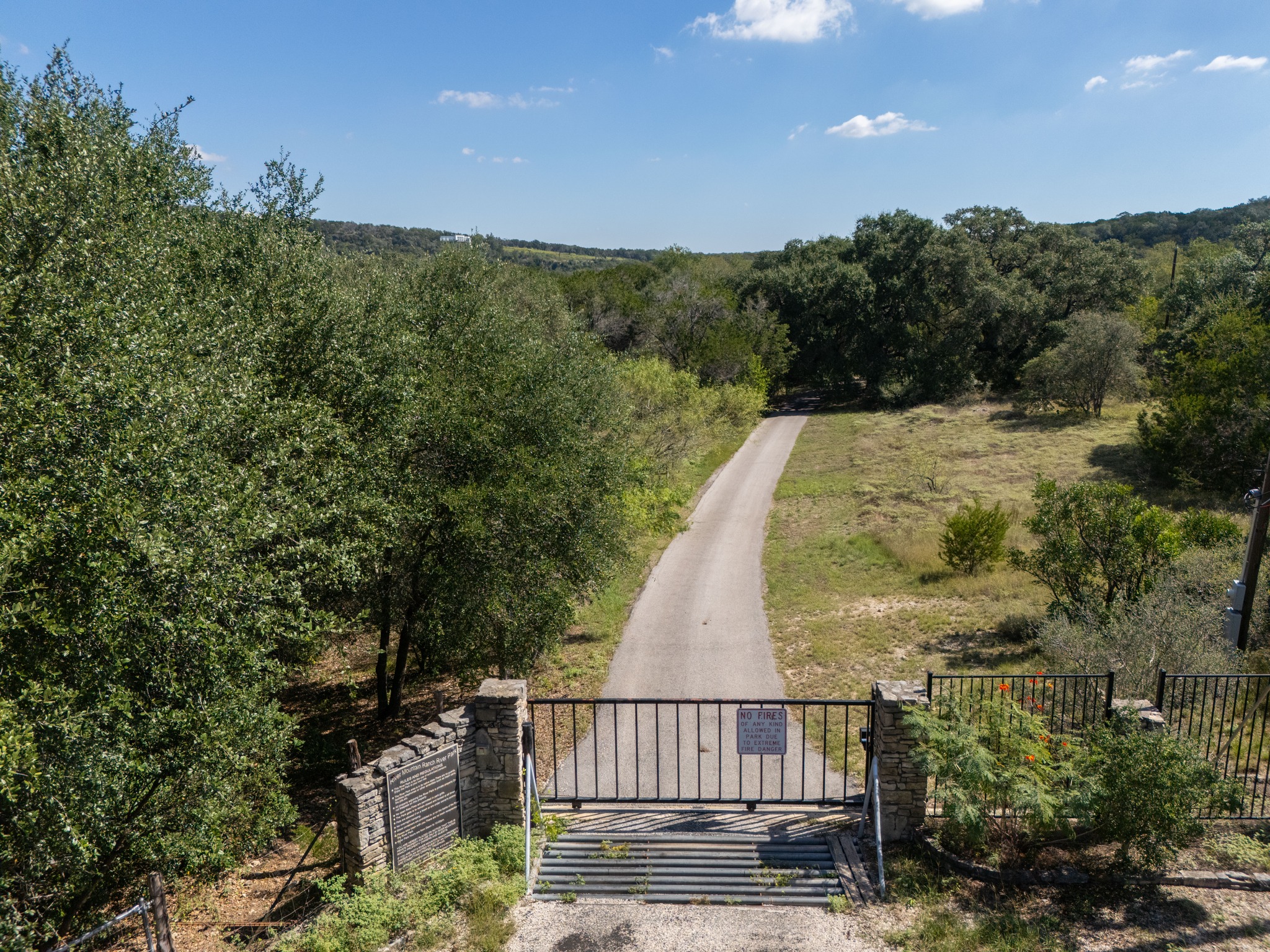 1001 Bluff View Road Wimberley, TX 78676 - Photo 14 of 20 The river park is kept private by a gated drive and maintained by the HOA.