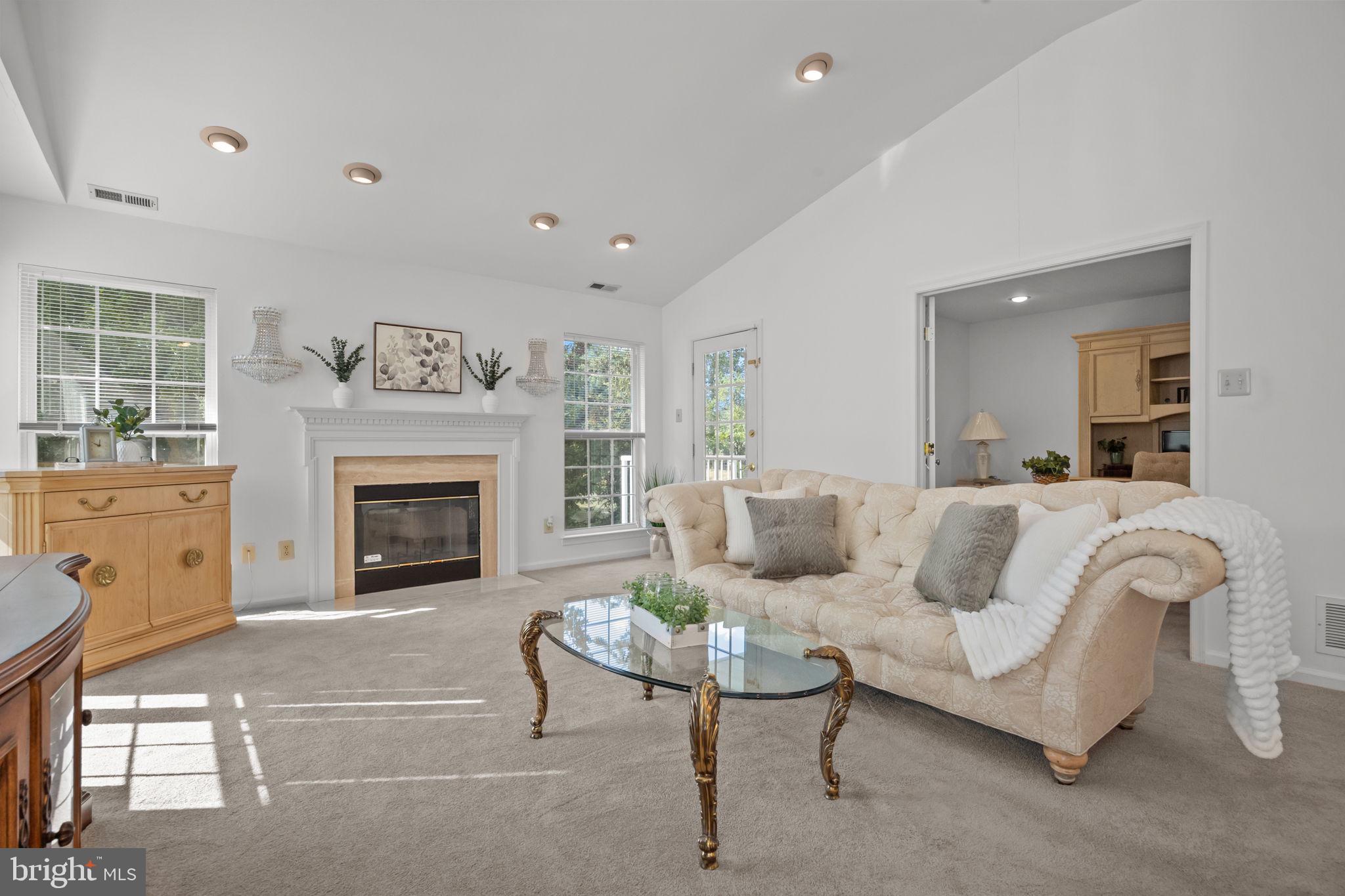 1102 Waterford Road, Unit 1 Yardley, PA 19067 - Photo 11 of 31 a living room with furniture and a fireplace