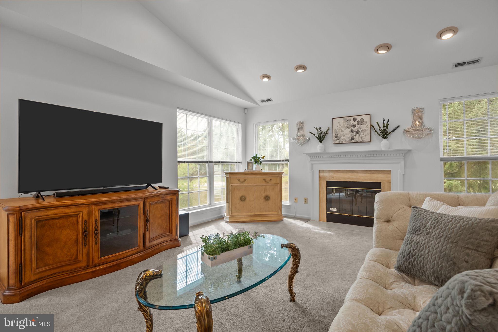 1102 Waterford Road, Unit 1 Yardley, PA 19067 - Photo 12 of 31 a living room with furniture and a flat screen tv