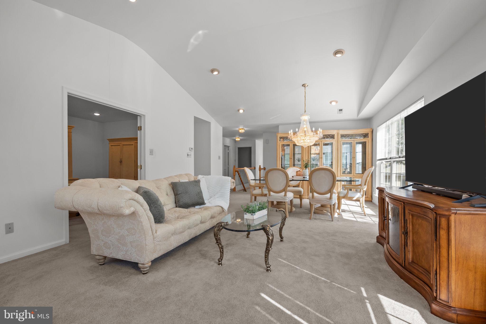 1102 Waterford Road, Unit 1 Yardley, PA 19067 - Photo 14 of 31 a living room with furniture and a flat screen tv