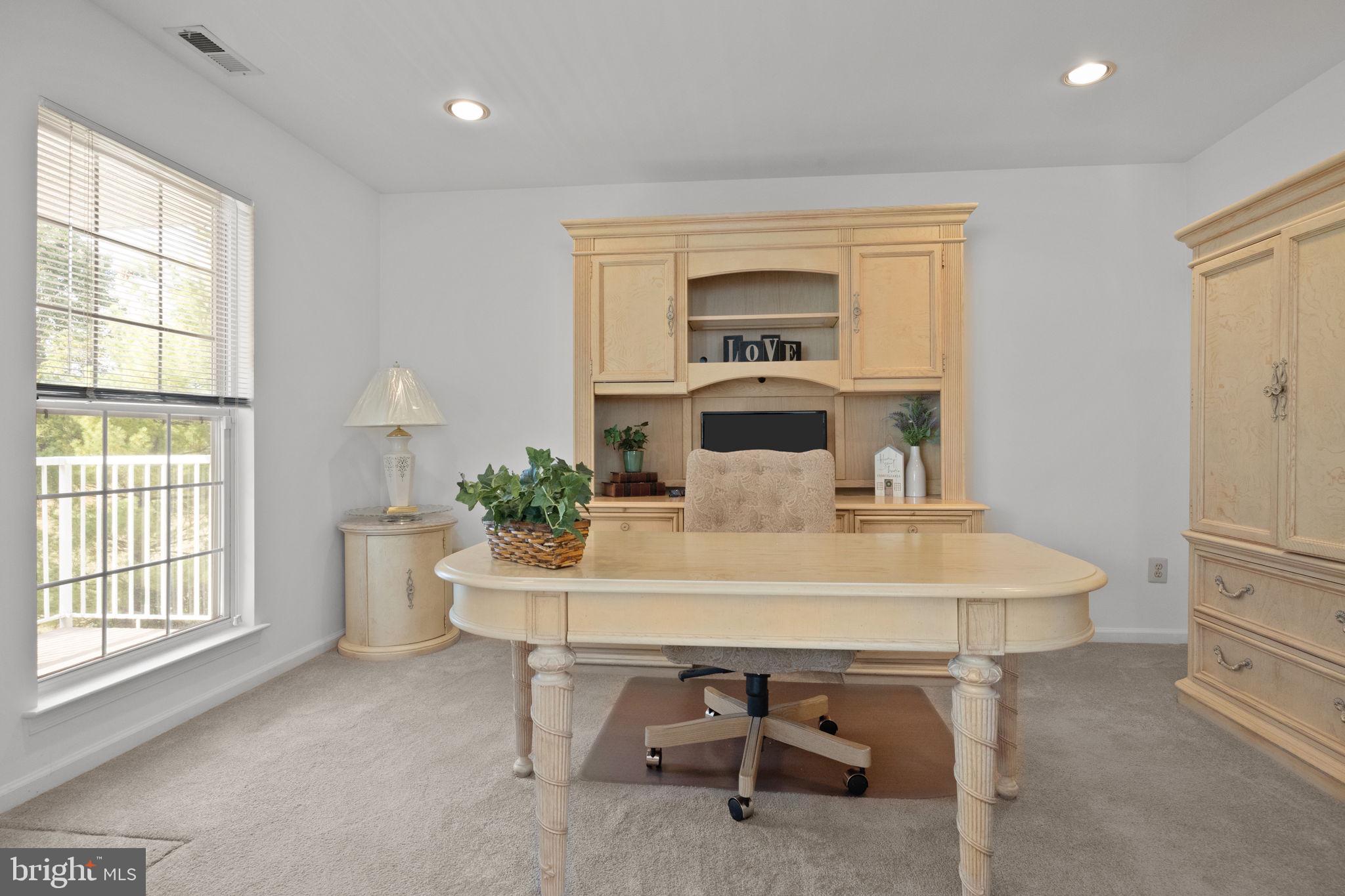 1102 Waterford Road, Unit 1 Yardley, PA 19067 - Photo 15 of 31 a view of a dining room with furniture and window
