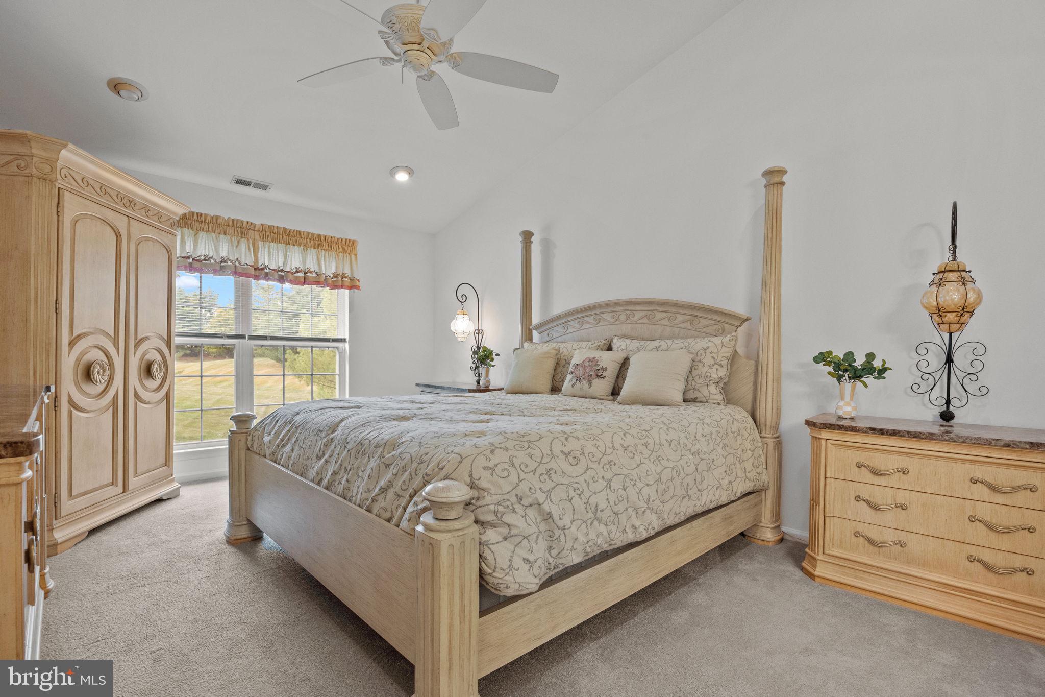 1102 Waterford Road, Unit 1 Yardley, PA 19067 - Photo 16 of 31 a bedroom with a large bed and a window
