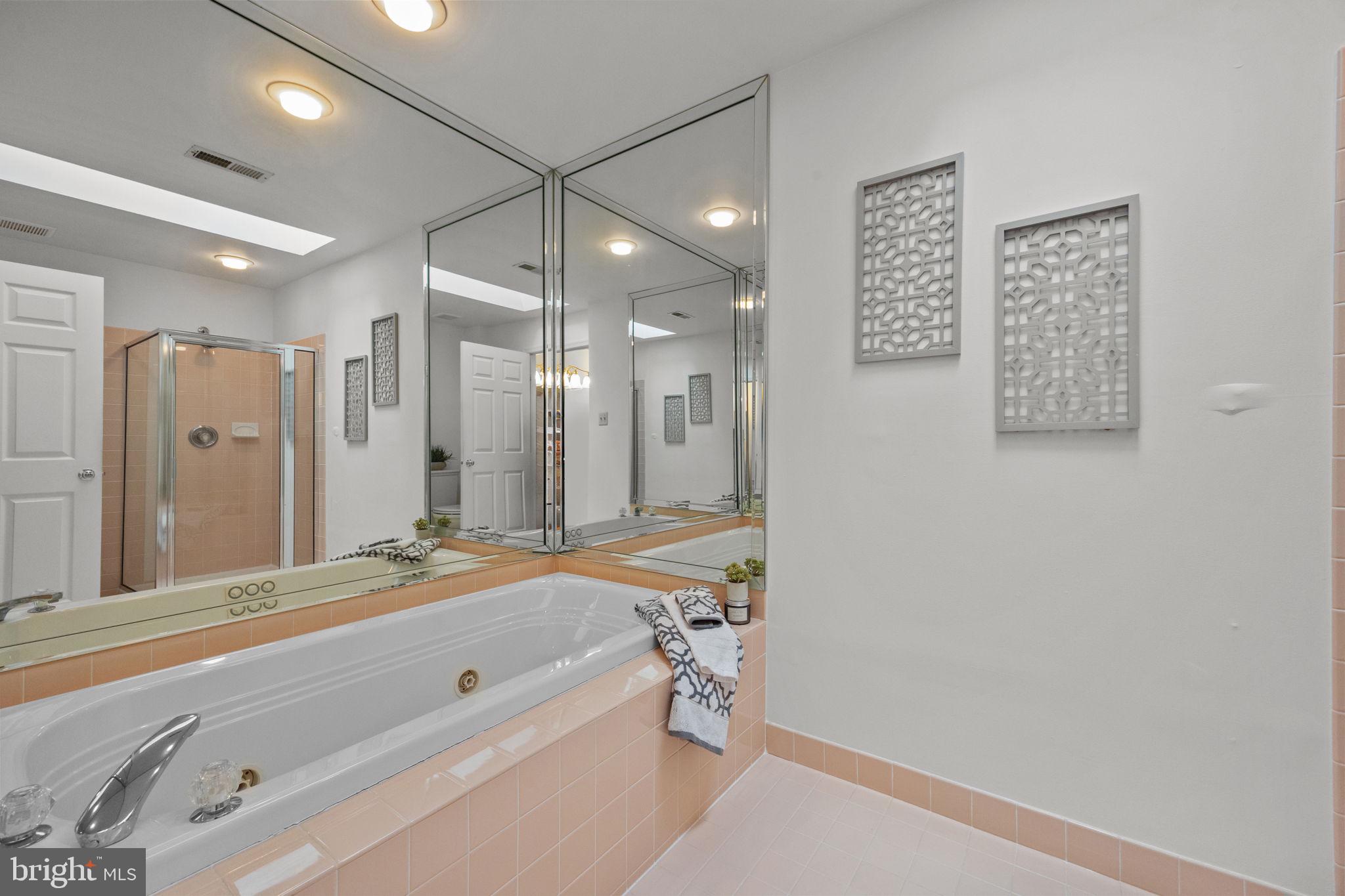 1102 Waterford Road, Unit 1 Yardley, PA 19067 - Photo 19 of 31 a bathroom with a granite countertop sink a toilet and shower