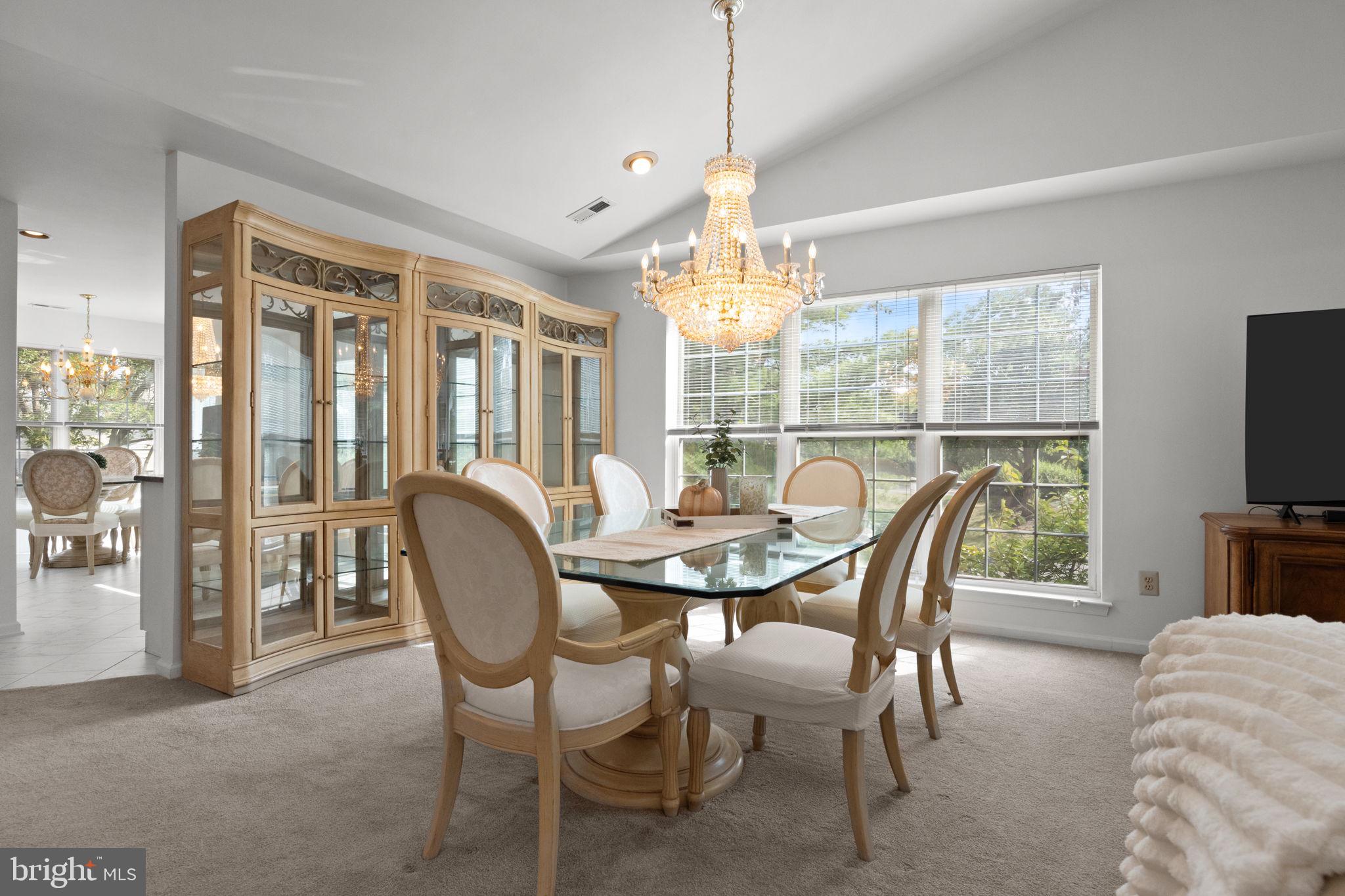 1102 Waterford Road, Unit 1 Yardley, PA 19067 - Photo 9 of 31 a view of a dining room with furniture window and outside view