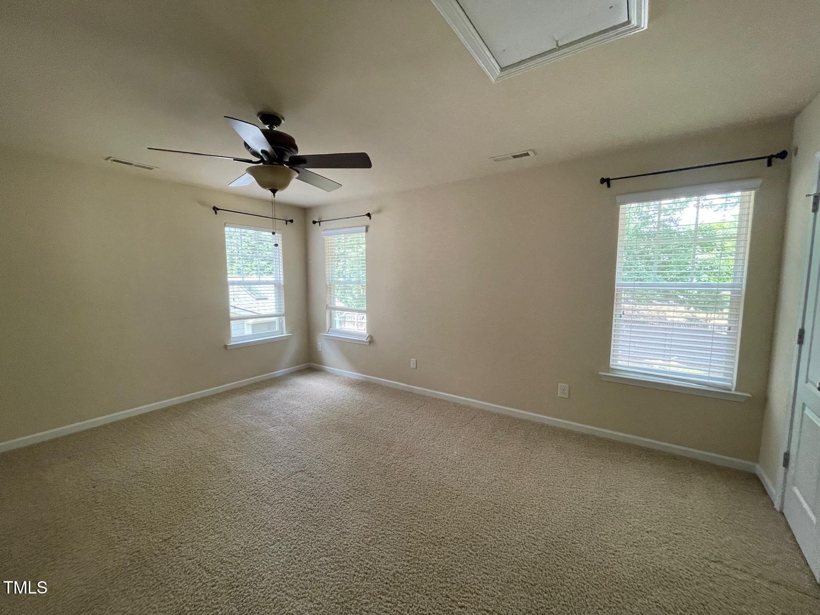 2107 Toad Hollow Trail Apex, NC 27502 - Photo 11 of 28 a view of an empty room with a window
