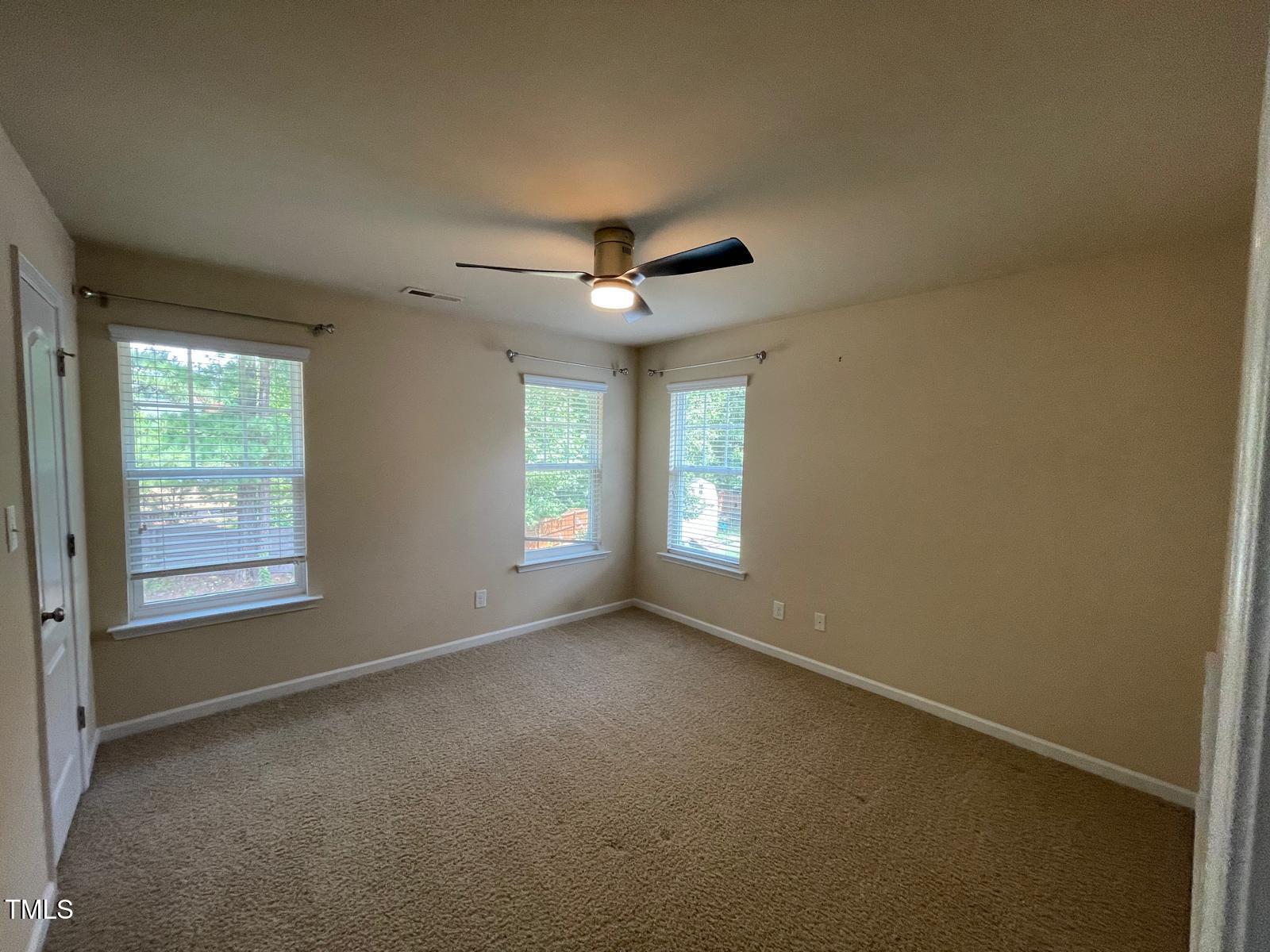2107 Toad Hollow Trail Apex, NC 27502 - Photo 17 of 28 an empty room with a window