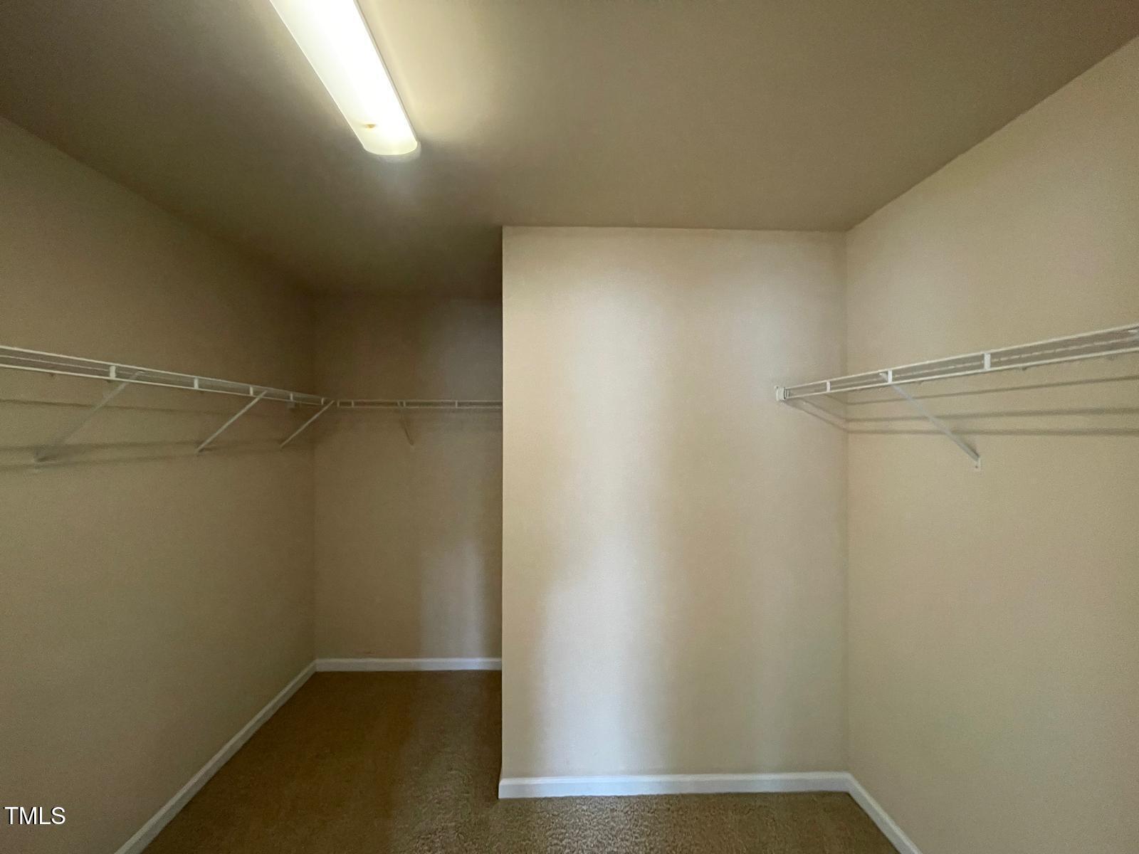 2107 Toad Hollow Trail Apex, NC 27502 - Photo 10 of 28 a view of a room with racks on the wall