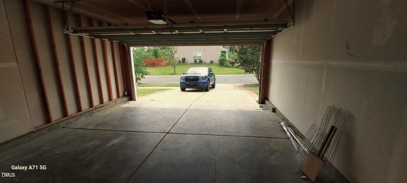 201 Jasper Point Drive Holly Springs, NC 27540 - Photo 18 of 23 a view of a porch