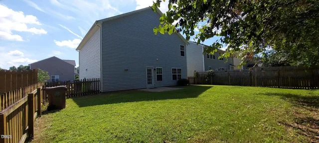 a view of a golf course with a lake