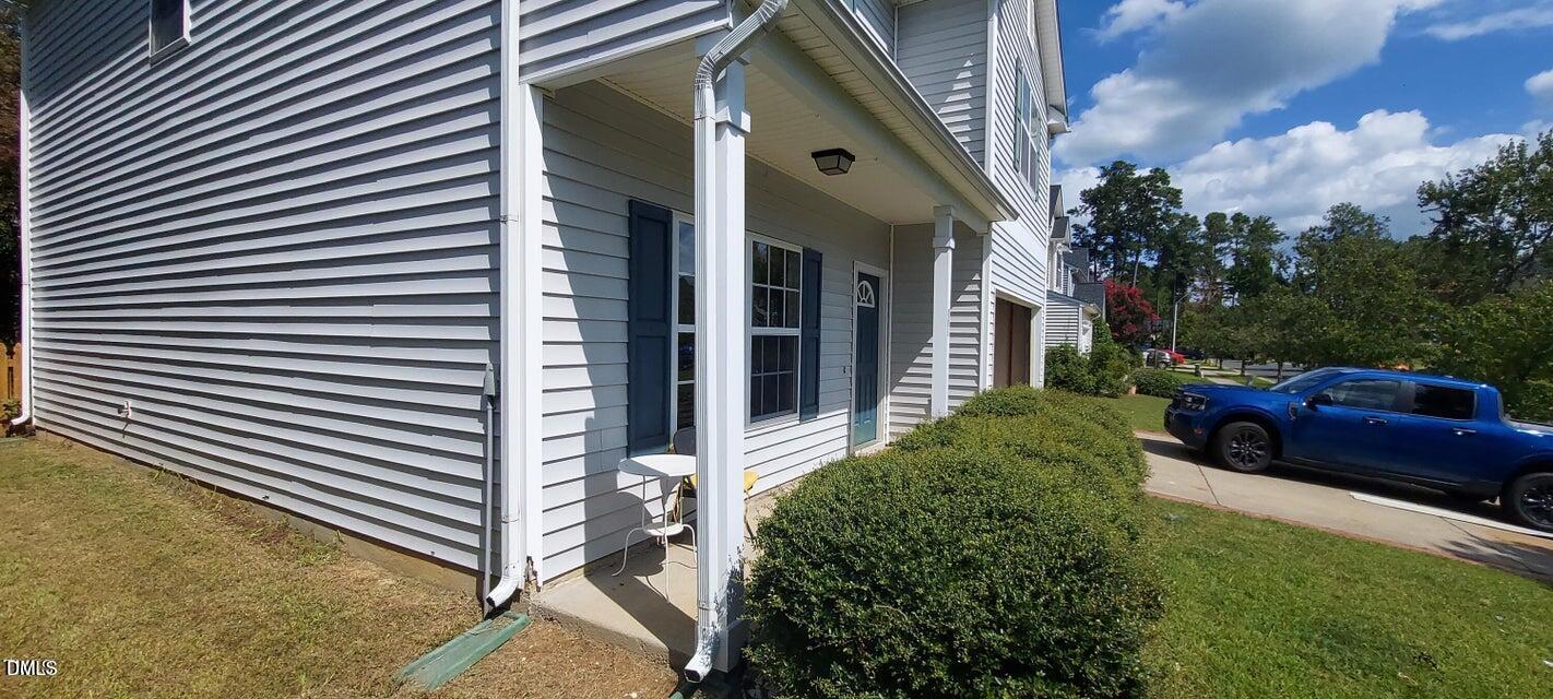 201 Jasper Point Drive Holly Springs, NC 27540 - Photo 2 of 23 a view of a house with a yard and stairs